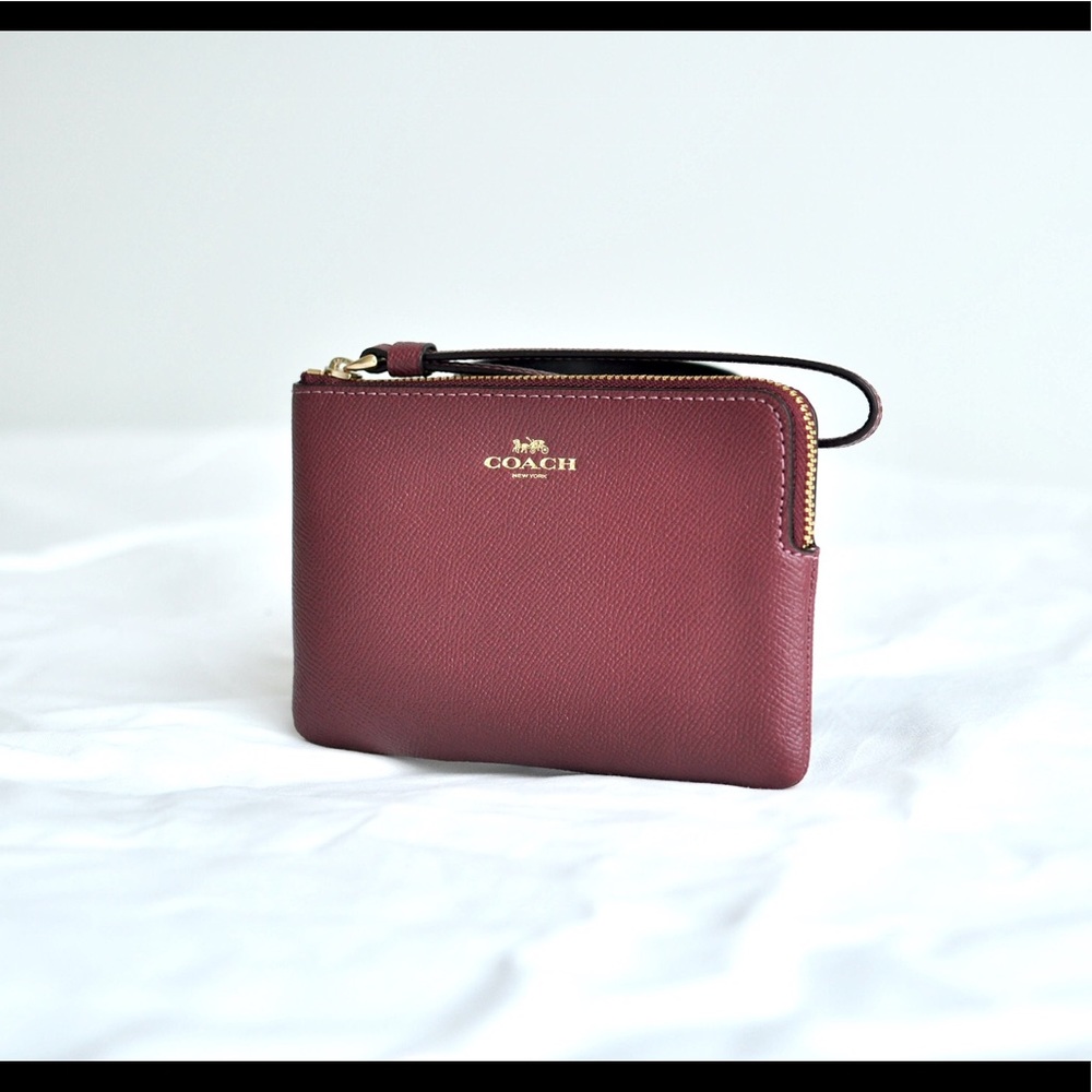Coach Wristlet in Wine Color (6” x 4”)
